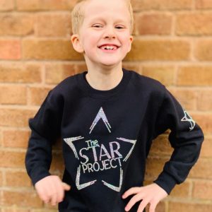 Star Project student happy because his Mum has added all the term dates to her dairy
